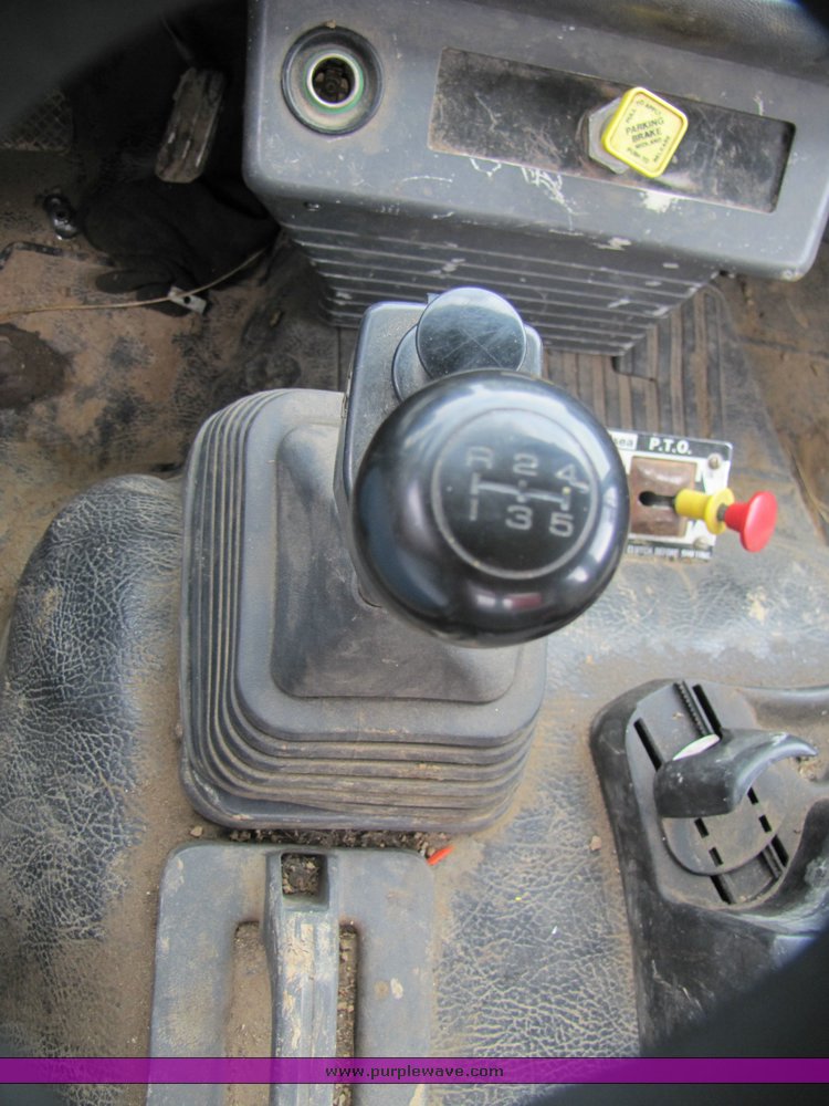 image for item 3326 1987 GMC 7000 forward cab over 24' rollback truck