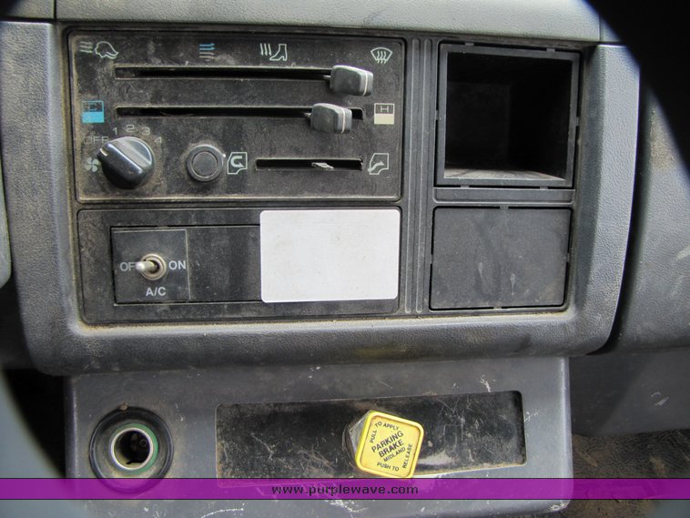 image for item 3326 1987 GMC 7000 forward cab over 24' rollback truck