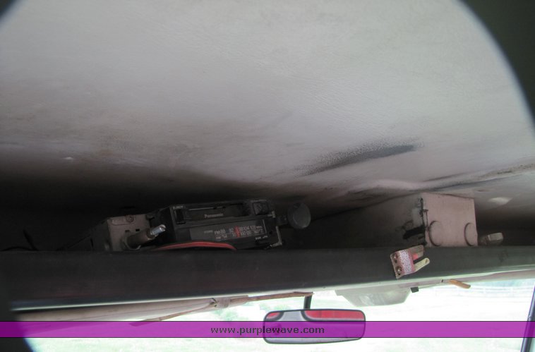 image for item 3326 1987 GMC 7000 forward cab over 24' rollback truck