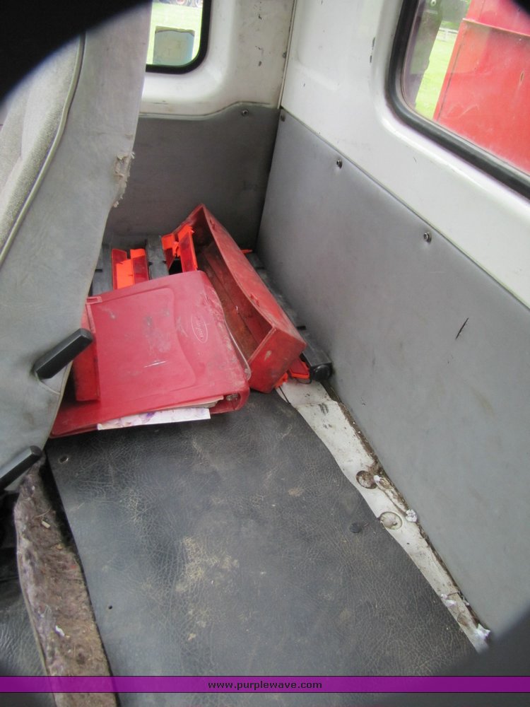 image for item 3326 1987 GMC 7000 forward cab over 24' rollback truck