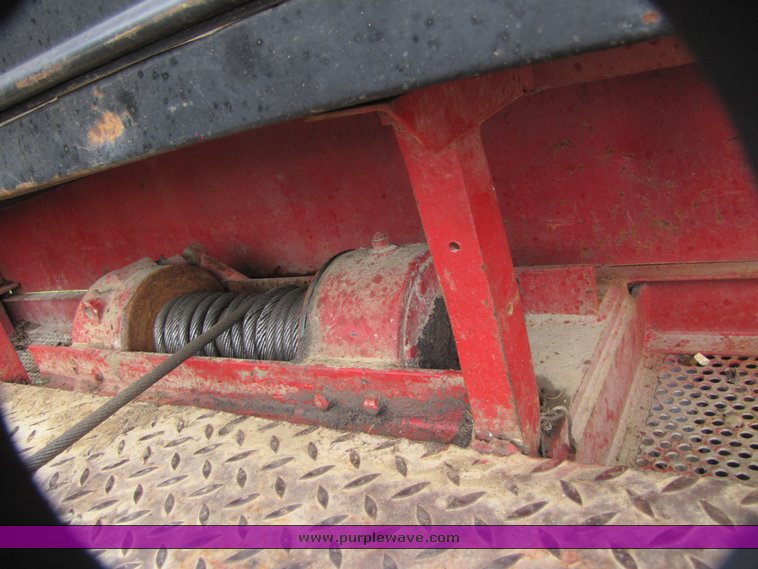 image for item 3326 1987 GMC 7000 forward cab over 24' rollback truck