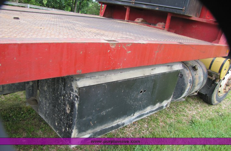 image for item 3326 1987 GMC 7000 forward cab over 24' rollback truck