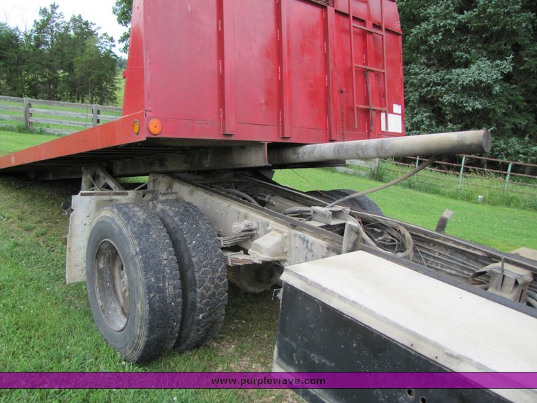 image for item 3326 1987 GMC 7000 forward cab over 24' rollback truck