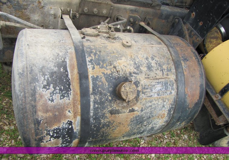 image for item 3326 1987 GMC 7000 forward cab over 24' rollback truck