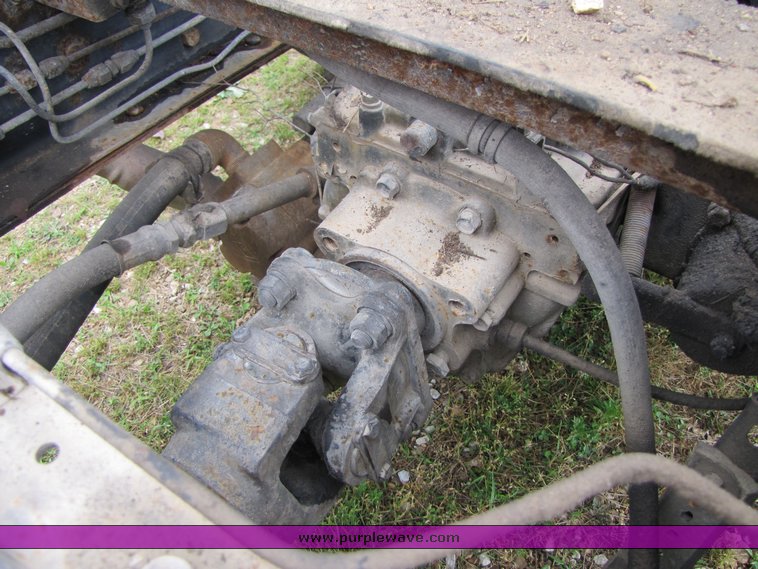 image for item 3326 1987 GMC 7000 forward cab over 24' rollback truck