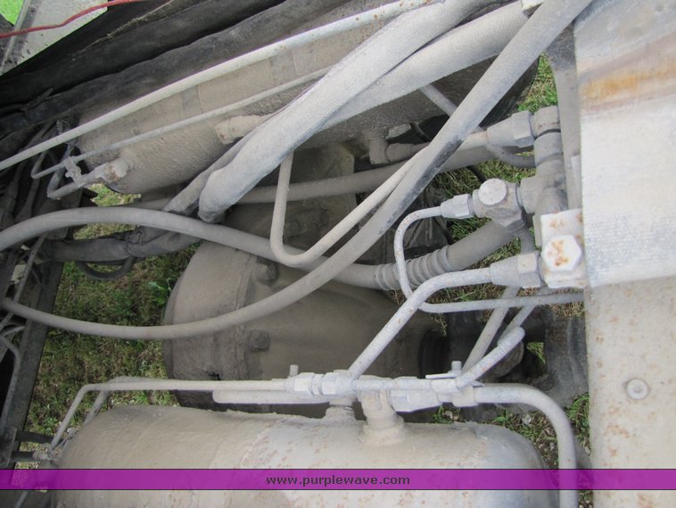 image for item 3326 1987 GMC 7000 forward cab over 24' rollback truck