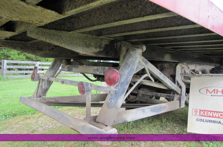 image for item 3326 1987 GMC 7000 forward cab over 24' rollback truck