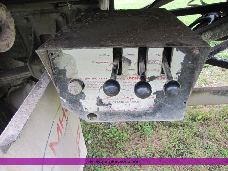 image for item 3326 1987 GMC 7000 forward cab over 24' rollback truck