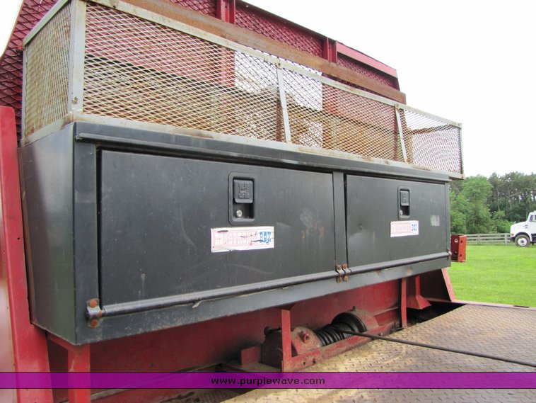 image for item 3326 1987 GMC 7000 forward cab over 24' rollback truck