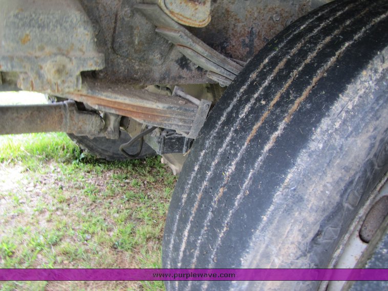 image for item 3326 1987 GMC 7000 forward cab over 24' rollback truck