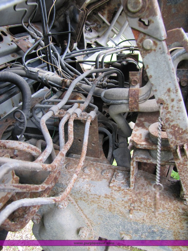 image for item 3326 1987 GMC 7000 forward cab over 24' rollback truck