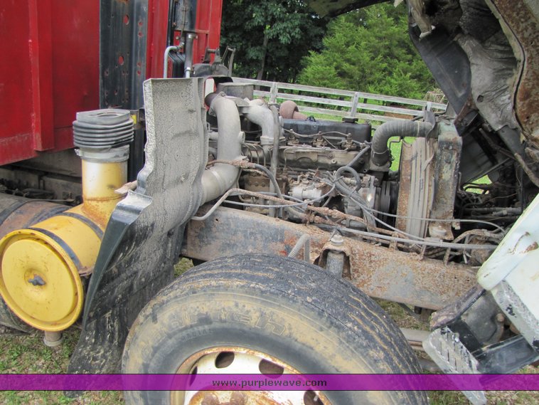 image for item 3326 1987 GMC 7000 forward cab over 24' rollback truck