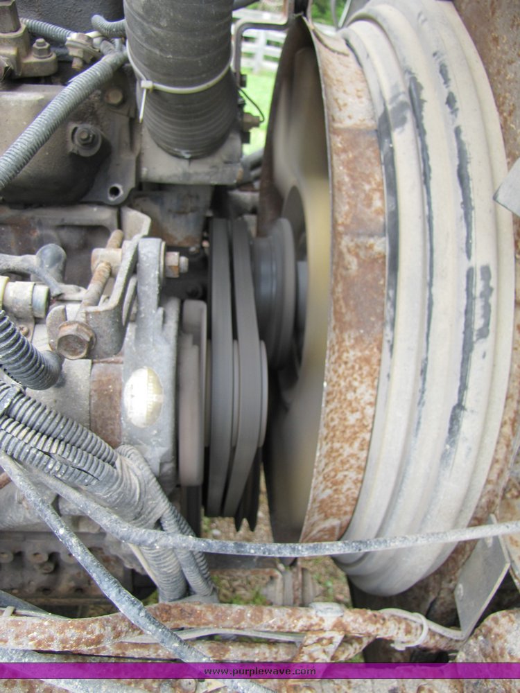 image for item 3326 1987 GMC 7000 forward cab over 24' rollback truck