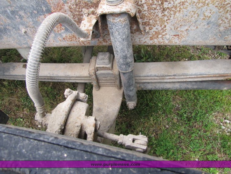 image for item 3326 1987 GMC 7000 forward cab over 24' rollback truck