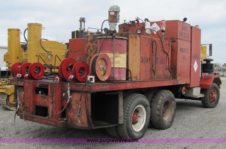 image for item 3349 1970 Autocar fuel lube semi truck