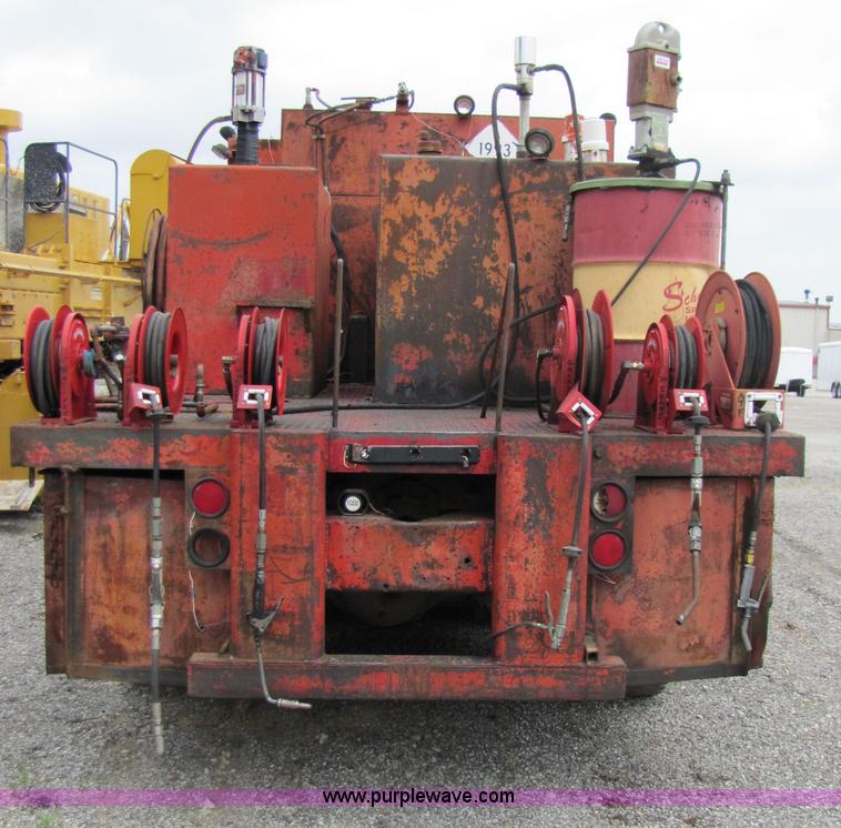 image for item 3349 1970 Autocar fuel lube semi truck