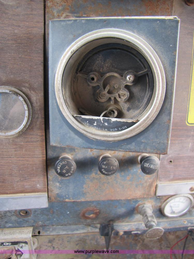 image for item 3349 1970 Autocar fuel lube semi truck