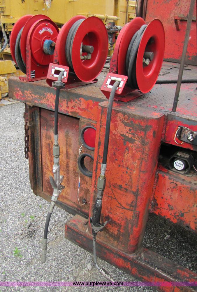 image for item 3349 1970 Autocar fuel lube semi truck