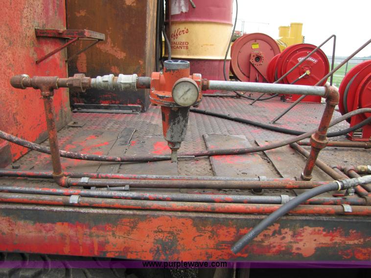 image for item 3349 1970 Autocar fuel lube semi truck