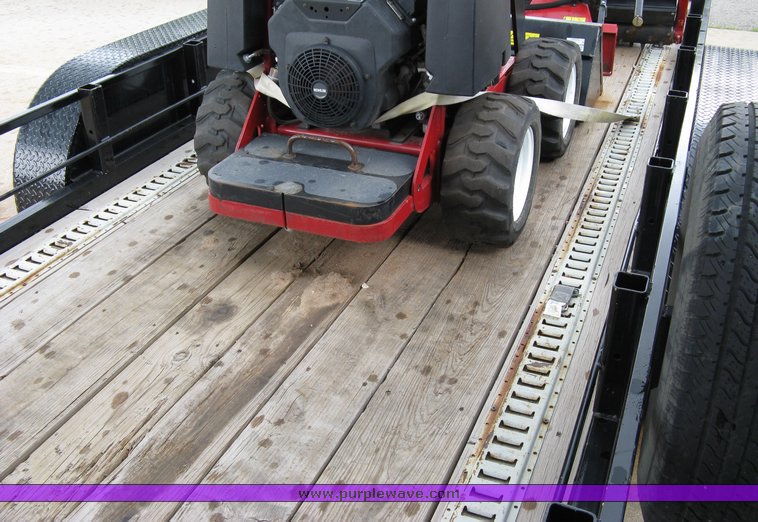 image for item 5011 Toro mini skid steer, attachments and custom trailer