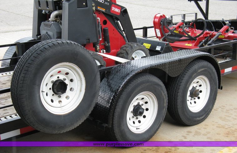 image for item 5011 Toro mini skid steer, attachments and custom trailer