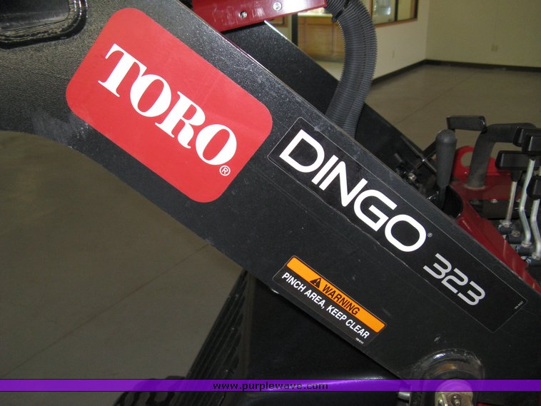 image for item 5011 Toro mini skid steer, attachments and custom trailer