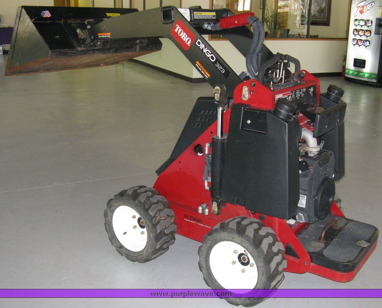 image for item 5011 Toro mini skid steer, attachments and custom trailer