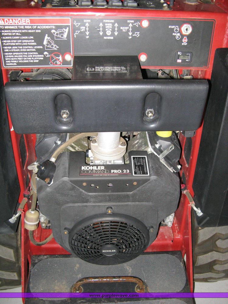 image for item 5011 Toro mini skid steer, attachments and custom trailer