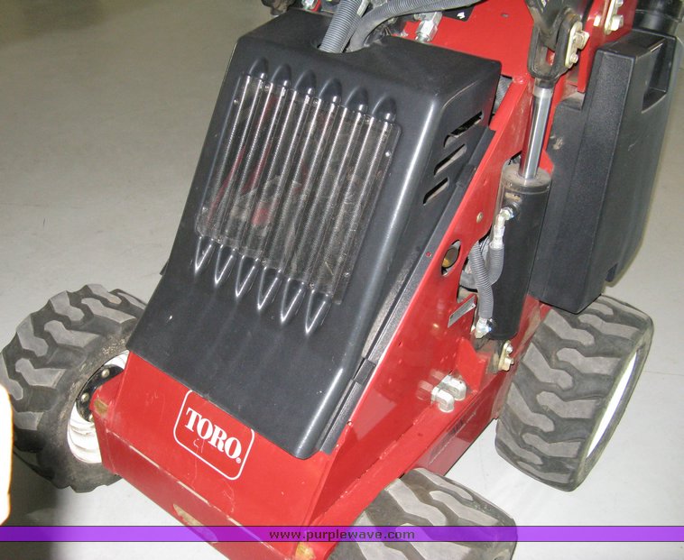 image for item 5011 Toro mini skid steer, attachments and custom trailer