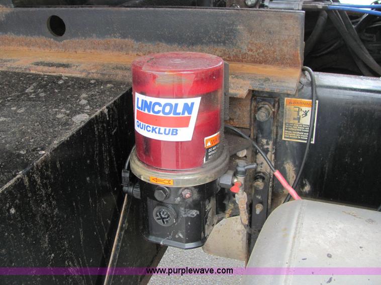 image for item 6123 2003 Peterbilt Conventional 330 tandem axle dump truck