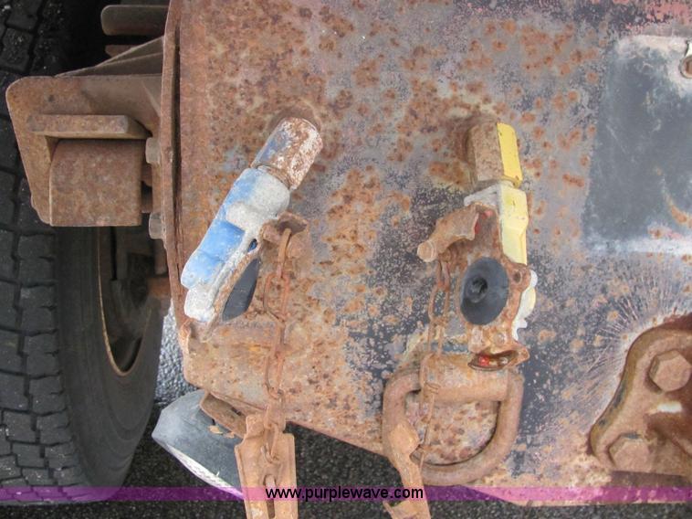 image for item 6124 1999 International Series 4900 single axle dump truck