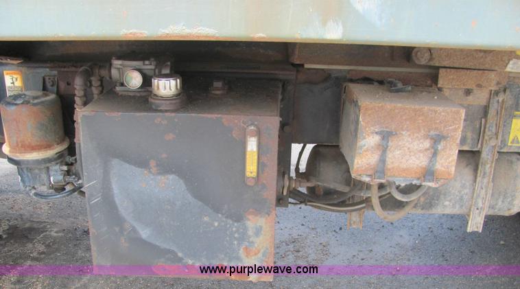 image for item 6125 2003 Peterbilt Conventional 330 Tandem axle dump truck