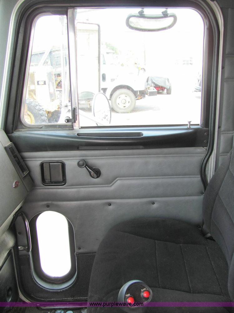 image for item 6125 2003 Peterbilt Conventional 330 Tandem axle dump truck