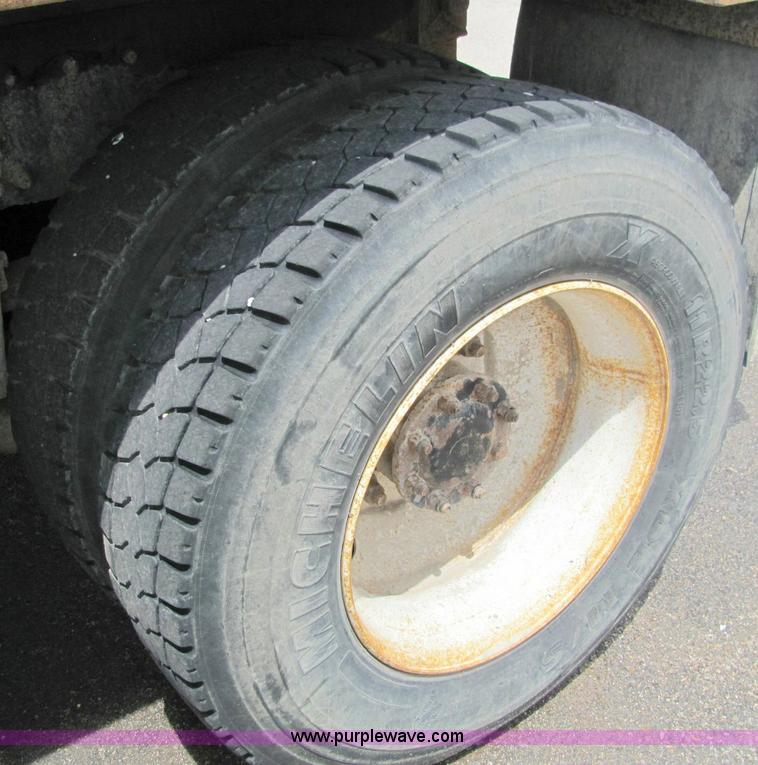 image for item 6125 2003 Peterbilt Conventional 330 Tandem axle dump truck