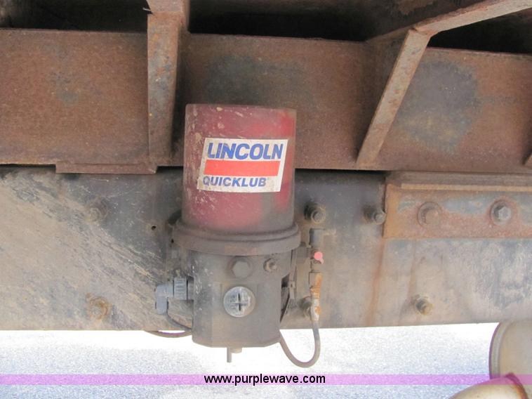 image for item 6171 2001 Peterbilt Conventional 330 tandem axle dump truck