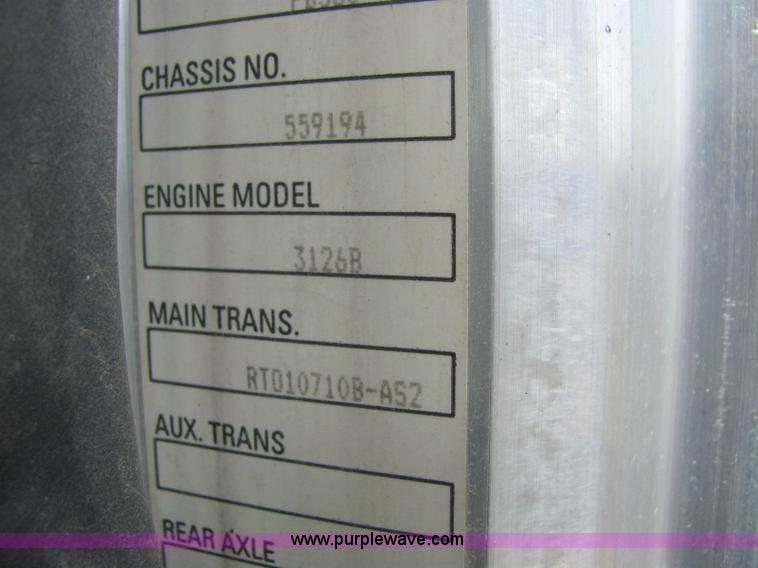 image for item 6171 2001 Peterbilt Conventional 330 tandem axle dump truck