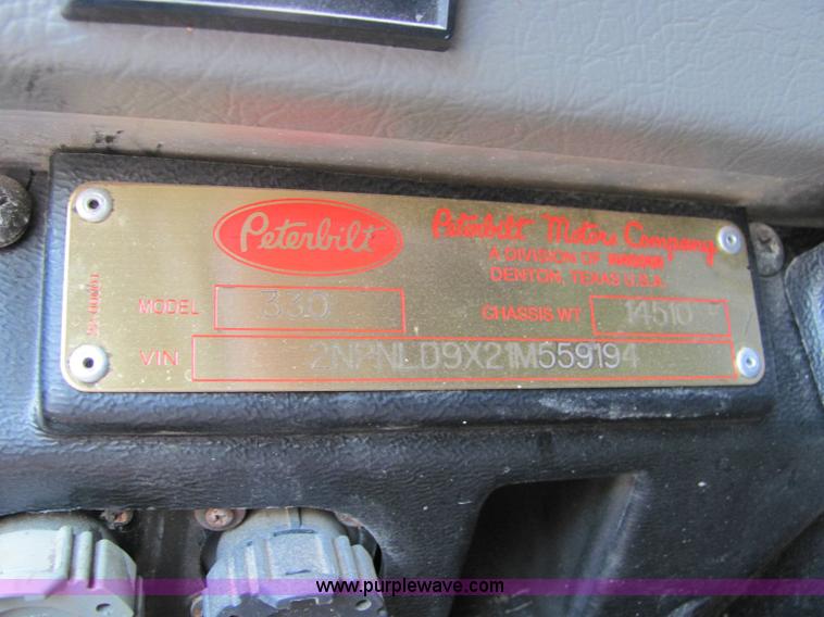 image for item 6171 2001 Peterbilt Conventional 330 tandem axle dump truck