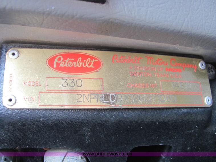 image for item 6172 2002 Peterbilt Conventional 330 tandem axle dump truck