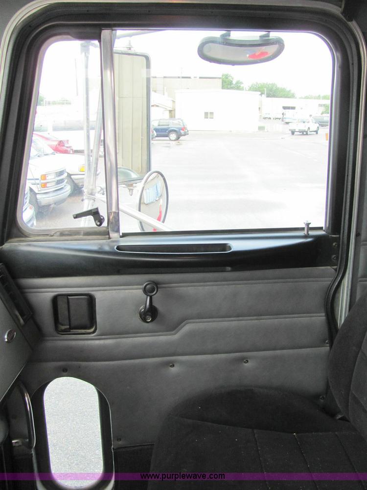 image for item 6173 2003 Peterbilt Conventional 330 tandem axle dump truck