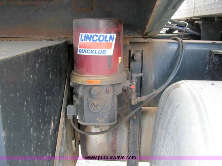 image for item 6173 2003 Peterbilt Conventional 330 tandem axle dump truck