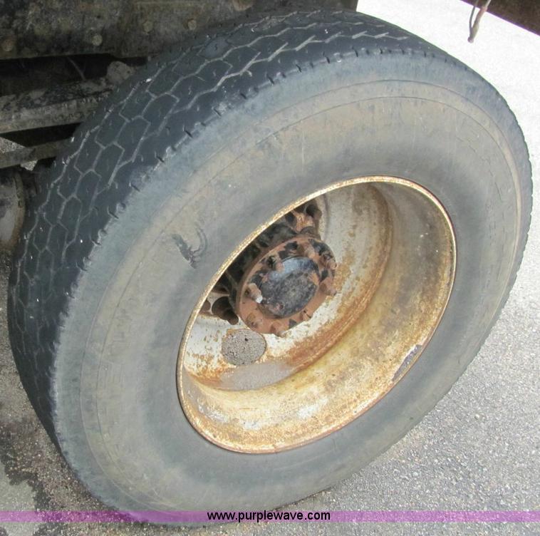 image for item 6178 2002 Peterbilt Conventional 330 tandem axle dump truck