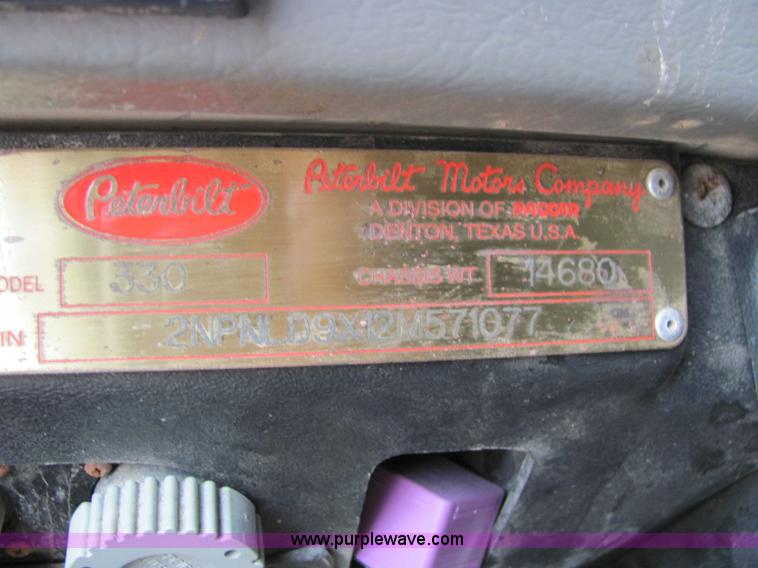 image for item 6178 2002 Peterbilt Conventional 330 tandem axle dump truck