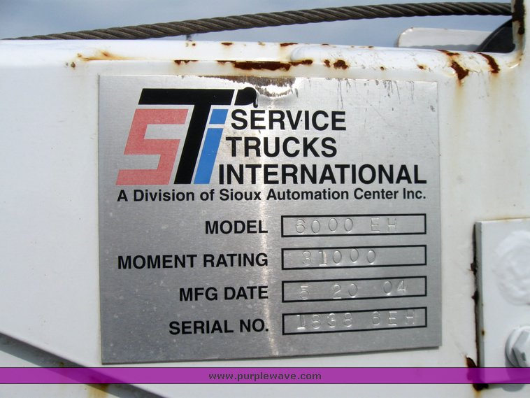 image for item 7390 2002 Ford F550 Super Duty truck with crane and service bed