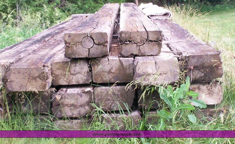 image for item 1006 (20) 8" x 15" x 24' creosote timbers