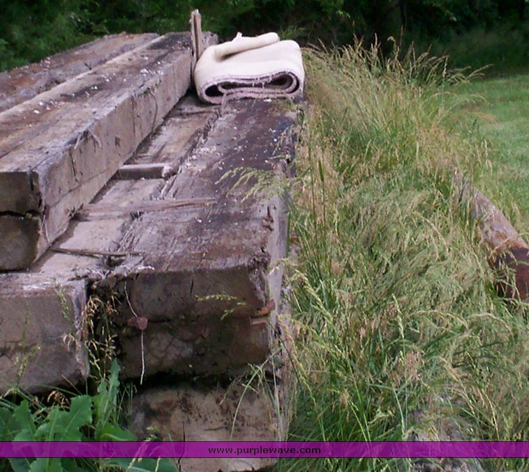 image for item 1006 (20) 8" x 15" x 24' creosote timbers