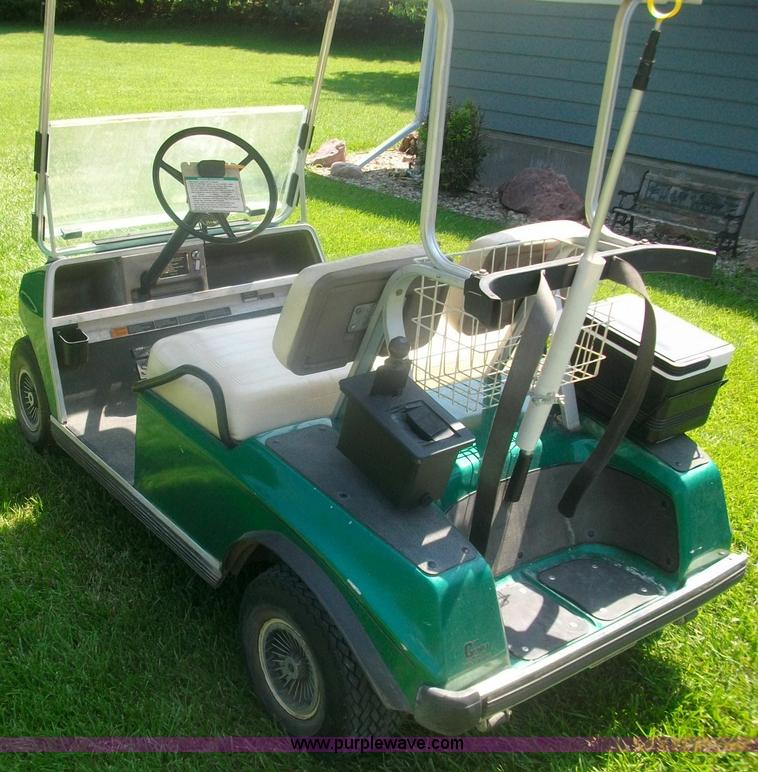 image for item 1014 Glub Car electric golf cart with topper