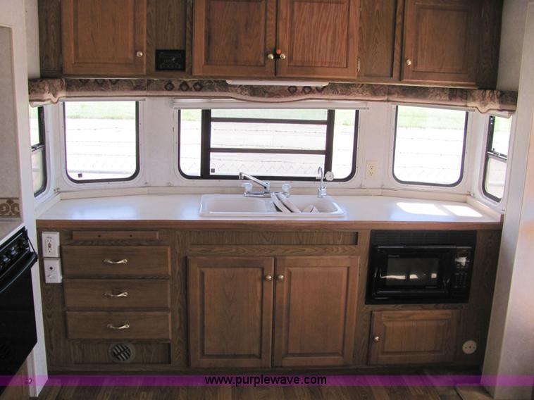 image for item 6189 2000 Hitch Hiker fifth wheel camper