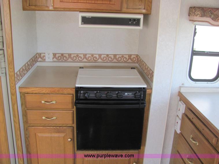 image for item 6189 2000 Hitch Hiker fifth wheel camper