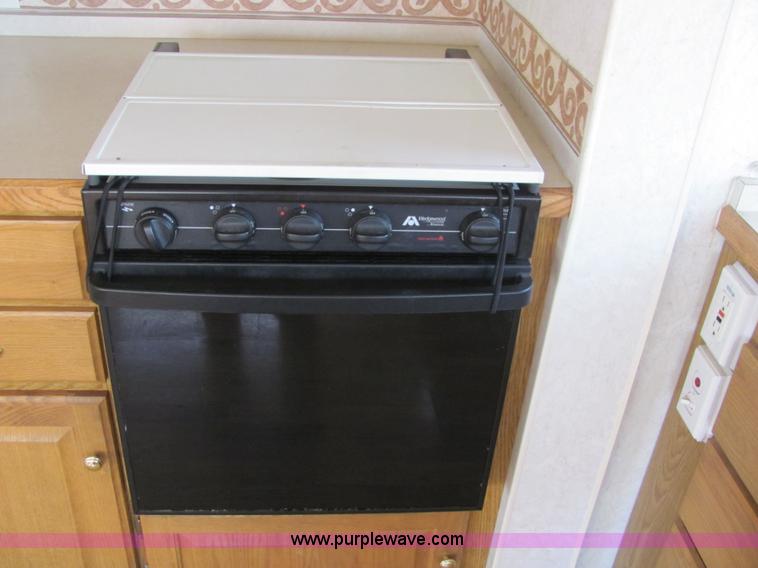 image for item 6189 2000 Hitch Hiker fifth wheel camper