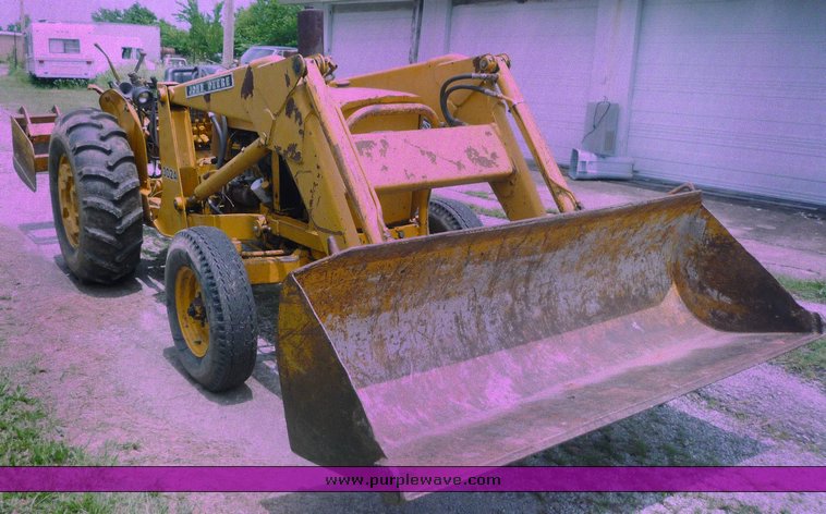 image for item 1801 1981 John Deere 302A tractor with loader